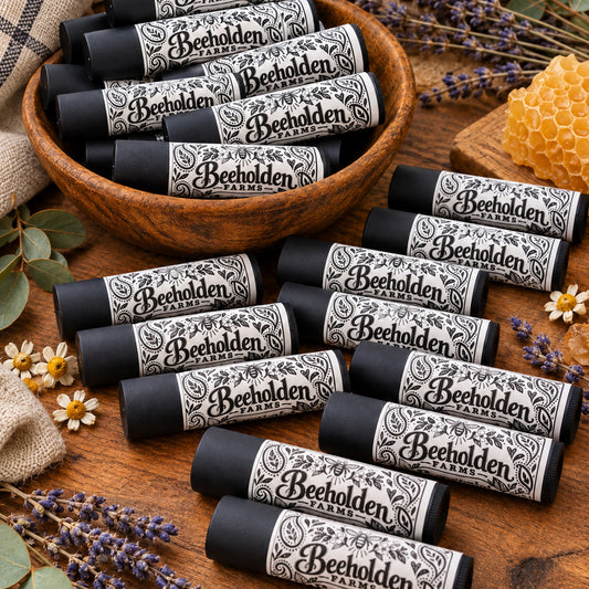 Beeholden Farms peppermint beeswax lip balm in kraft, black and clear tubes