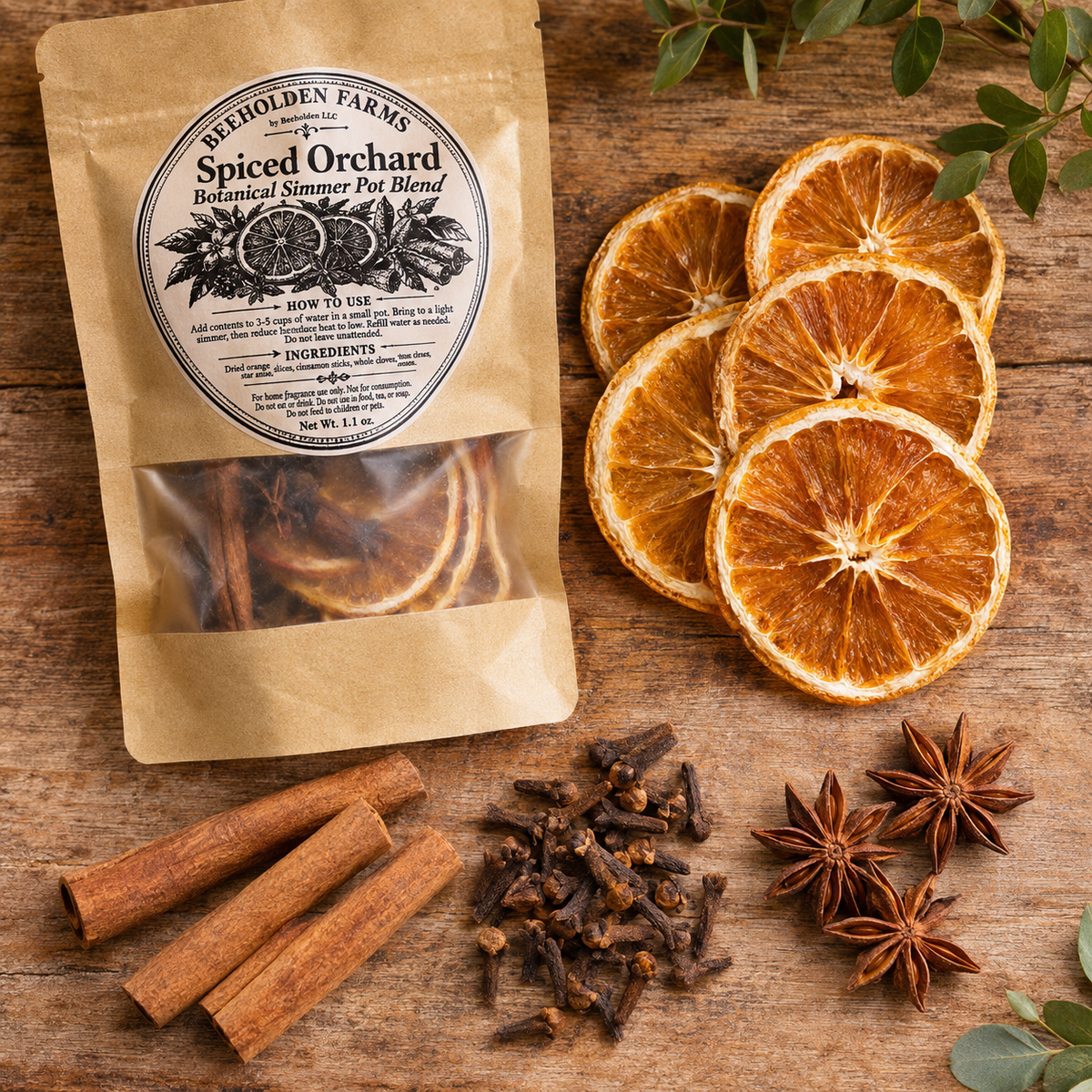 Spiced Orchard botanical simmer pot blend pouch by Beeholden Farms with dried orange slices, cinnamon sticks, whole cloves and star anise